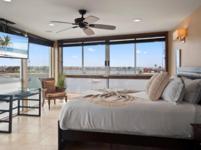 Stunning Bayfront condo with gorgeous views, garage, massive roof deck & AC - dogs welcome!
